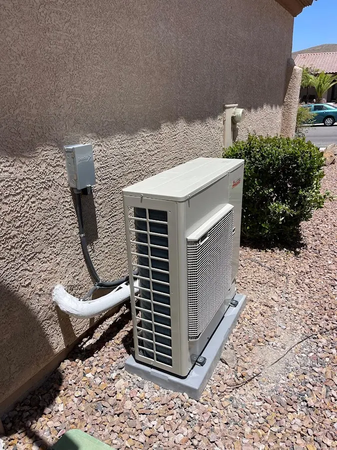 Residential air conditioning condenser unit in Wyldwood